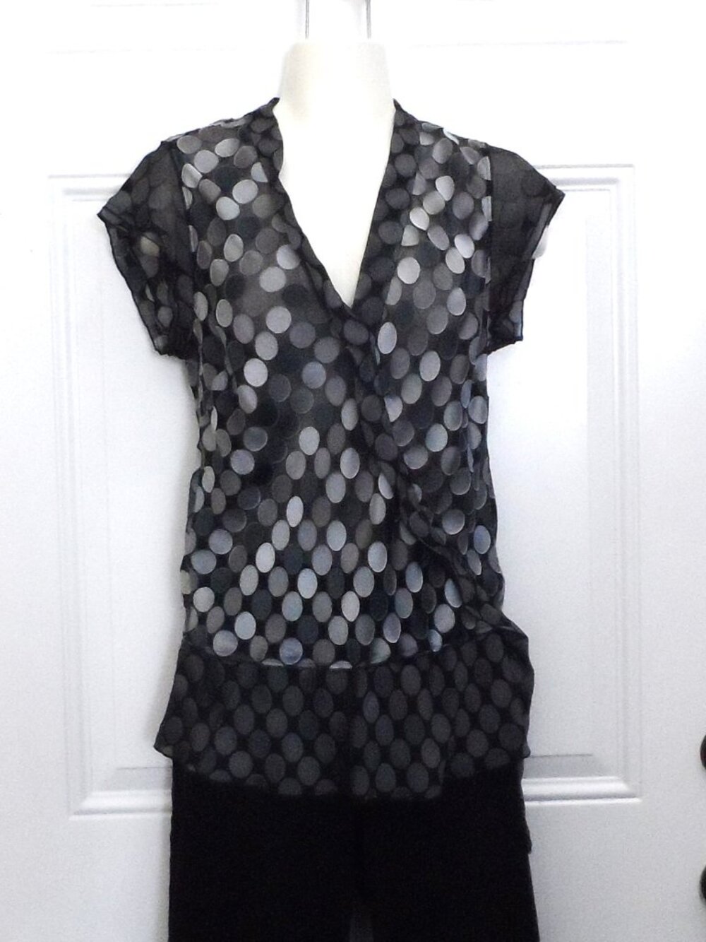 BCBGMaxAzria sheer silk-blend blouse featuring a black and gray polka dot . Sz S